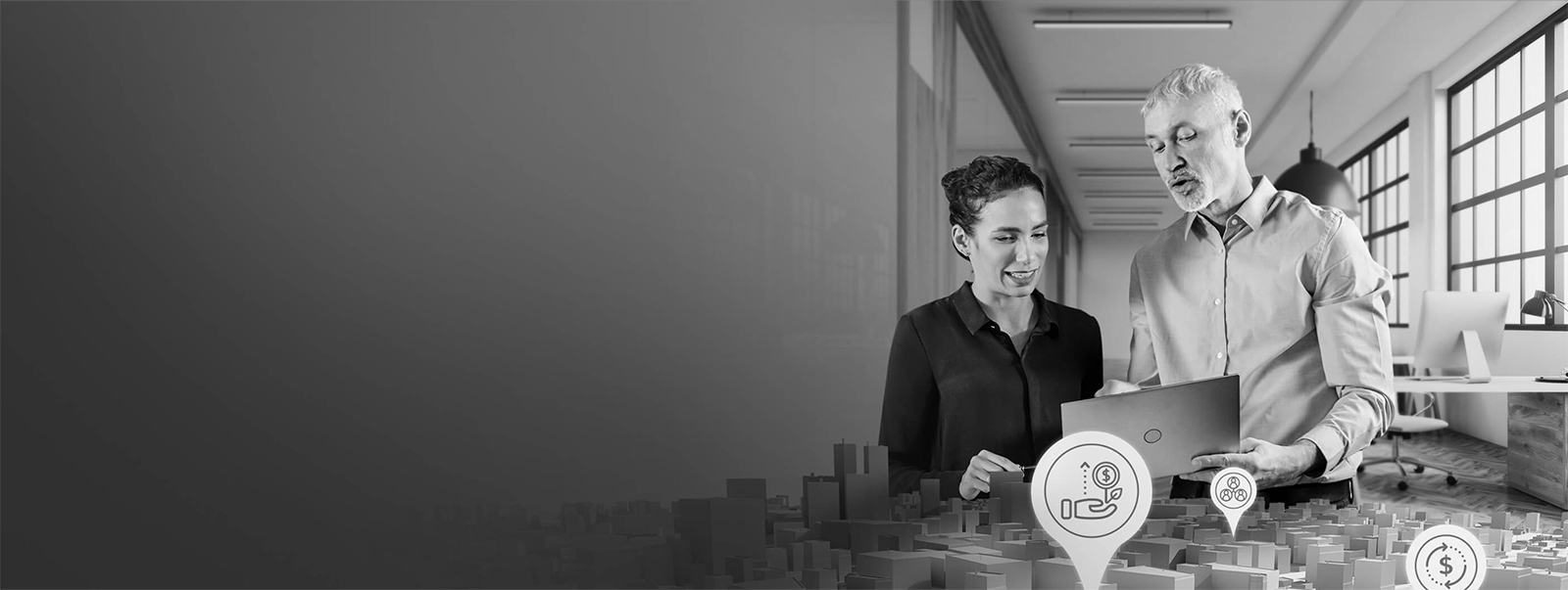 two people talking over a city model